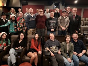 a large group of people in holiday attire